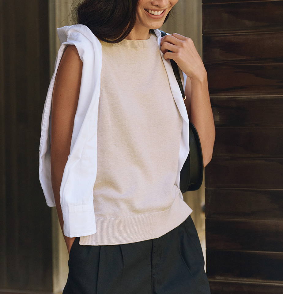 woman in fine knit cardigan